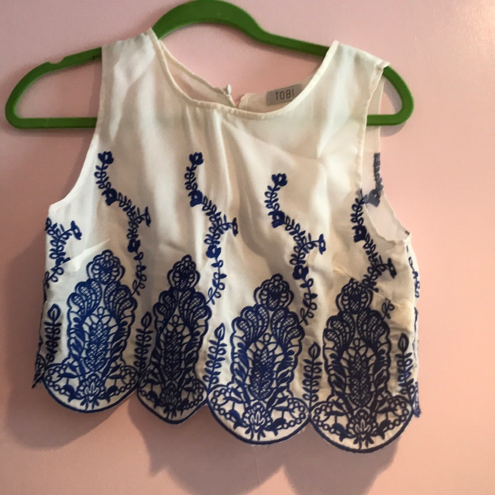 White tank top with royal blue accents